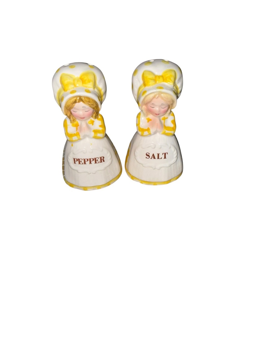Vintage yellow and white praying girl shakers